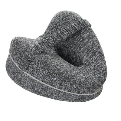 Gray orthopedic knee pillow with elastic strap and breathable fabric for pregnancy and side sleeping support.