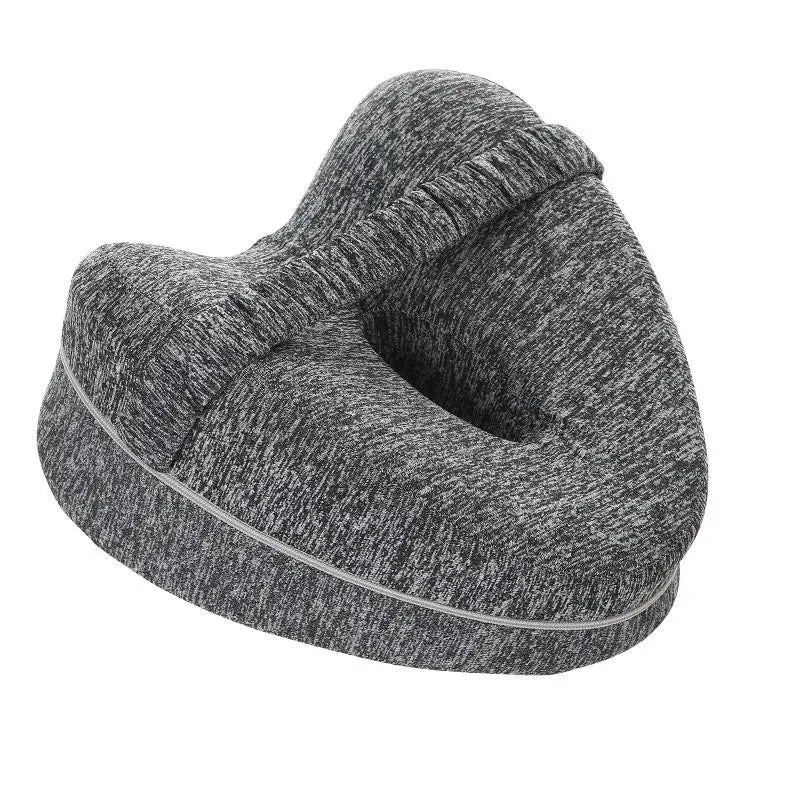 Gray orthopedic knee pillow with elastic strap and breathable fabric for pregnancy and side sleeping support.