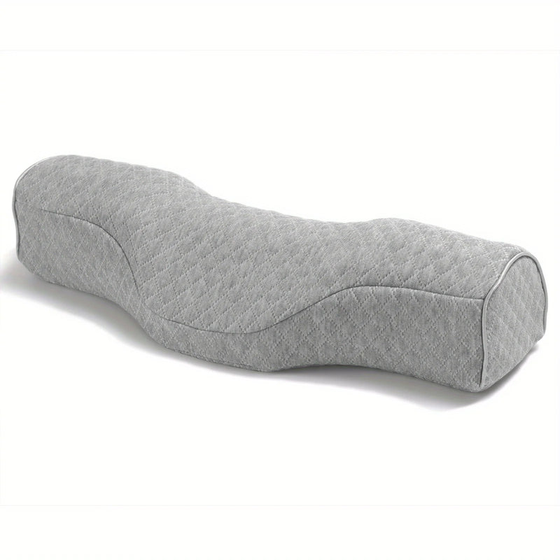 Gray orthopedic memory foam neck pillow with ergonomic contour, ideal for pain relief and cervical spine support.